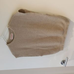 Beige sweater vest.